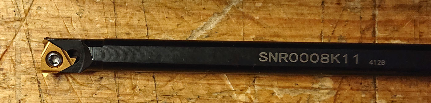 Skärhållare.